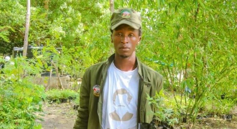 Teddy Mukaria Githinji planting trees