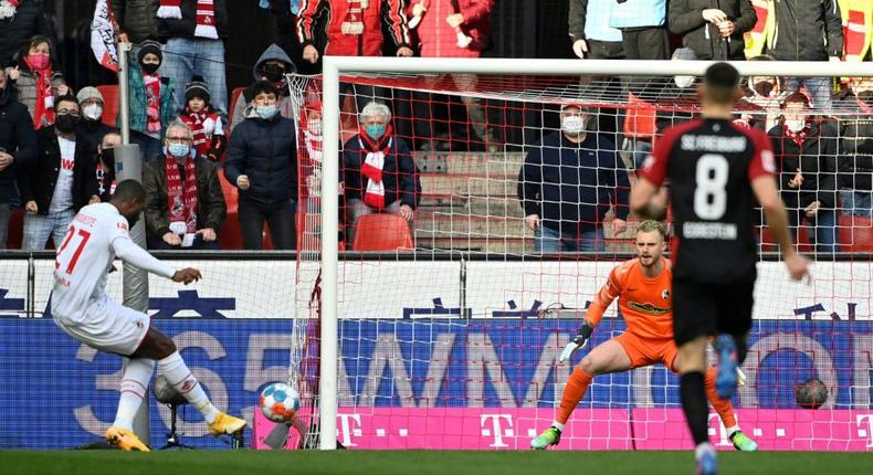 Cologne's French forward Anthony Modeste (L) scored the only goal in a win over SC Freiburg Creator: Ina Fassbender