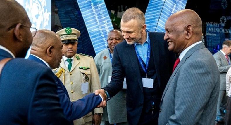 Andrey Melnichenko welcomes the Chairman of the African Union Azali Assoumani at COP28 in Dubai