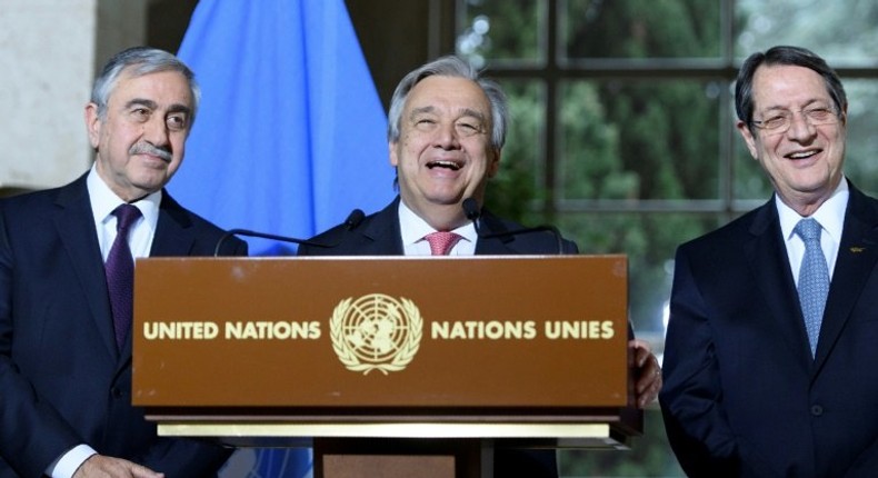 UN Secretary-General Antonio Guterres (centre) is flanked by Turkish Cypriot leader Mustafa Akinci (left) and Greek Cypriot President Nicos Anastasiades during a press conference in Geneva, on January 12, 2017