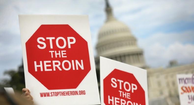 Activists and family members of people who have died from opioid/heroin use take part in a Fed Up! rally at Capitol Hill in Washington, DC