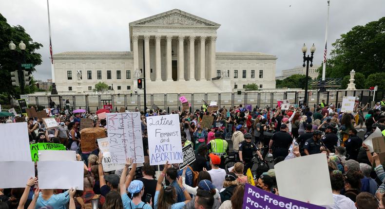 Abortion rights activists participate in a Bans Off Our Bodies rally at the U.S. Supreme Court on May 14, 2022.