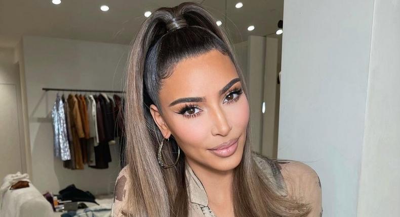 Kim Kardashian in a sleek high ponytail {instagram/kimkardashian}