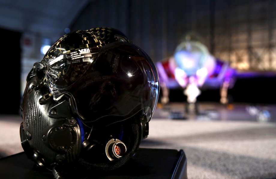 A Gen 3 helmet is seen in front of a Lockheed Martin F-35 Lightning II fighter jet at Patuxent River Naval Air Station in Maryland October 28, 2015.