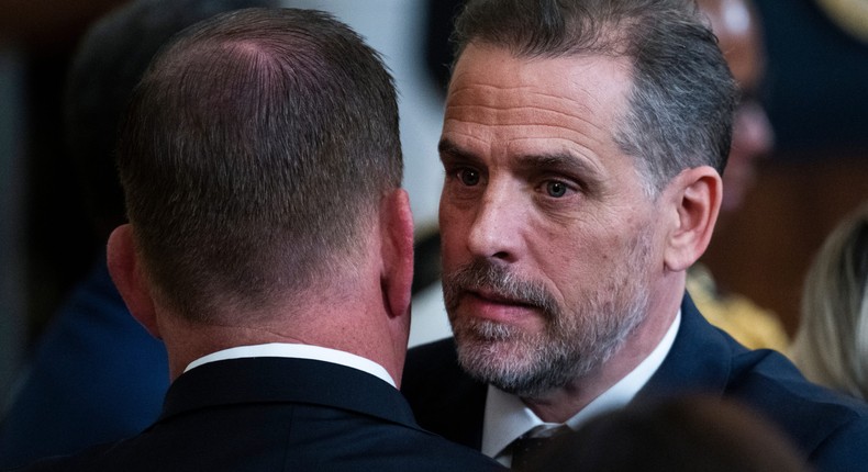 Hunter Biden, right, the son of President Joe Biden, greets Labor Secretary Marty Walsh during a ceremony to present the Presidential Medal of Freedom, the nation's highest civilian honor, to 17 recipients at the White House on Thursday, July 7, 2022.Tom Williams/CQ-Roll Call, Inc via Getty Images