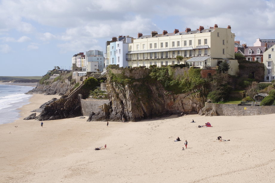 25. Castle Beach — Tenby, Wales: This Welsh beach has pretty multicoloured houses lining the shore and boats bobbing in a harbour. According to one review, it also has "lovely sand to lie on and make sand castles" and is worth visiting "in all kinds of weather."