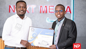 Next Media Chief Marketing Officer receiving the the certificate of appreciation from a MUBs representative