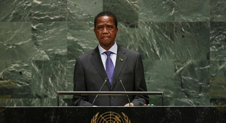 Zambia president Edgar Chagwa Lungu (pictured September 2019) is allegedly central to an illicit network of timber trafficking