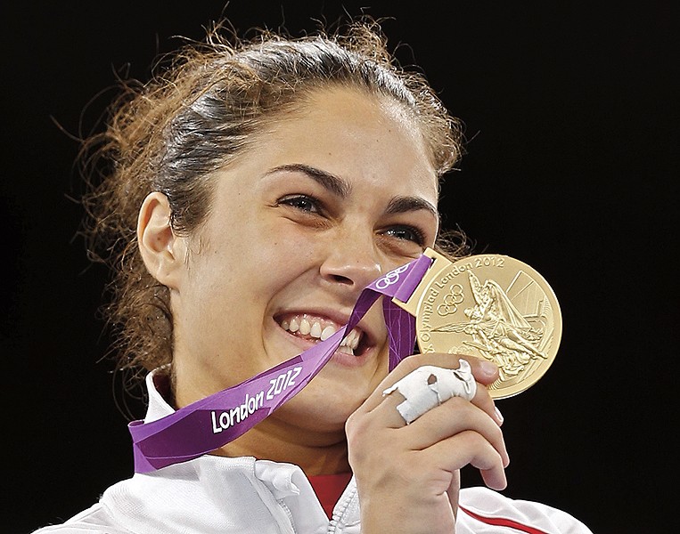 Gold medalist Milica Mandic of Serbia celebrates after winning the Women's +67kg Taekwondo Gold medal match on on Day 15 of the London 2012 Olympic Games at ExCeL on August 11, 2012 in London, England. (Photo by Hannah Peters/Getty Images)