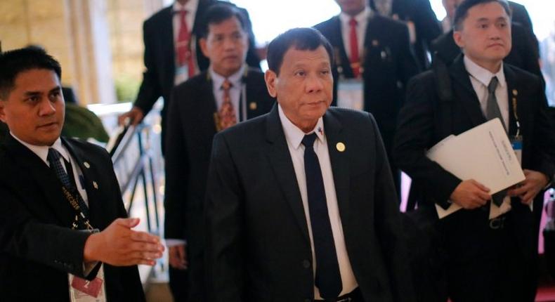 Philippine President Rodrigo Duterte arrives for a bilateral meeting with Russia's President Vladimir Putin on the sidelines of the Asia-Pacific Economic Cooperation Summit in Lima on November 19, 2016