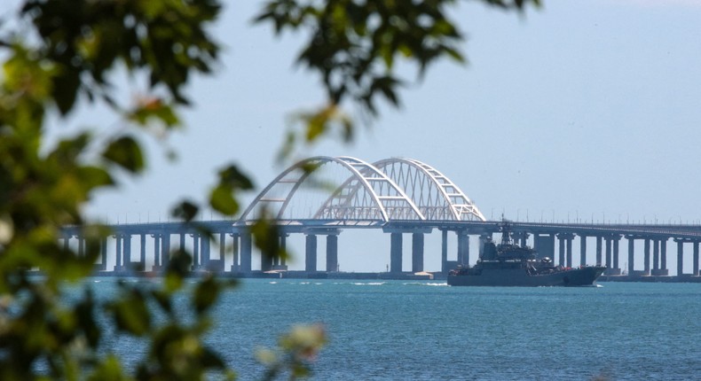 A Russian warship sailed near the Kerch Bridge linking the Russian mainland to Crimea in July 2023.STRINGER/AFP via Getty Images