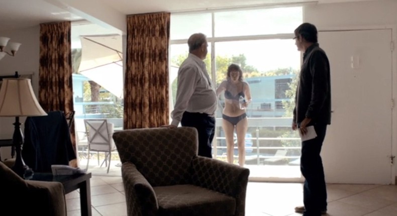 (L-R) Marty Rathbun, Louis Theroux meet Paz de la Huerta when she enters their hotel room in a bikini.