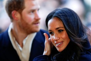 Britain's Prince Harry and his fiancee Meghan Markle arrive at an event in Nottingham