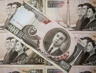 Ponura koreańska rzeczywistość: kupony zamiast pieniędzy, brak żywności i czarne łabędzie na mięso