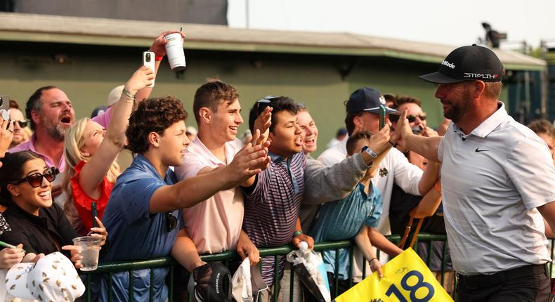 Michael Block gives high-fives to young fans at the PGA Championship.Scott Taetsch/PGA of America via Getty Images