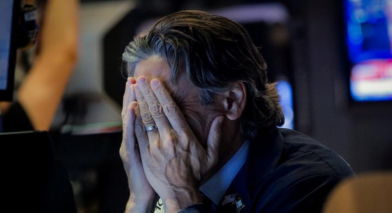 A trader reacts on the floor at the New York Stock Exchange (NYSE) in New York, U.S., August 5, 2019. REUTERS/Brendan McDermid