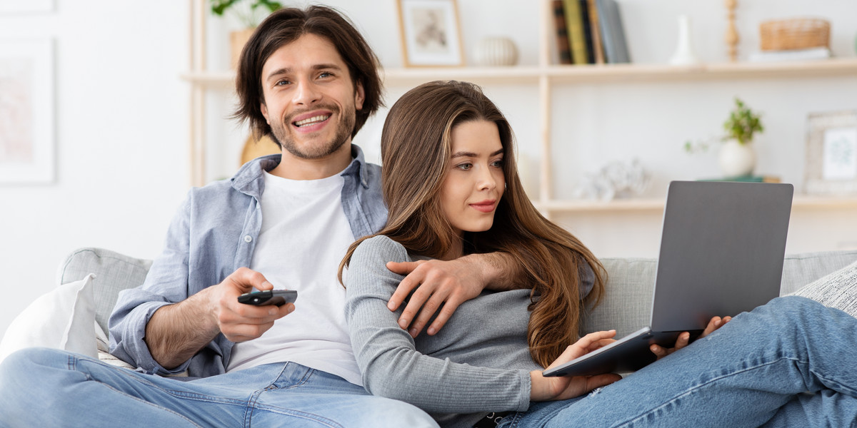 Relaxed married couple spending weekend at home