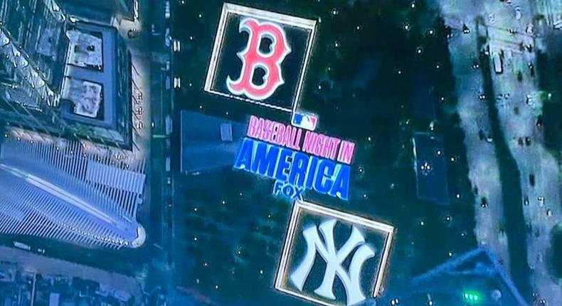 The Baseball Night in America logo, alongside the Yankee and Red Sox logo, superimposed onto an image of the 9/11 memorial pools