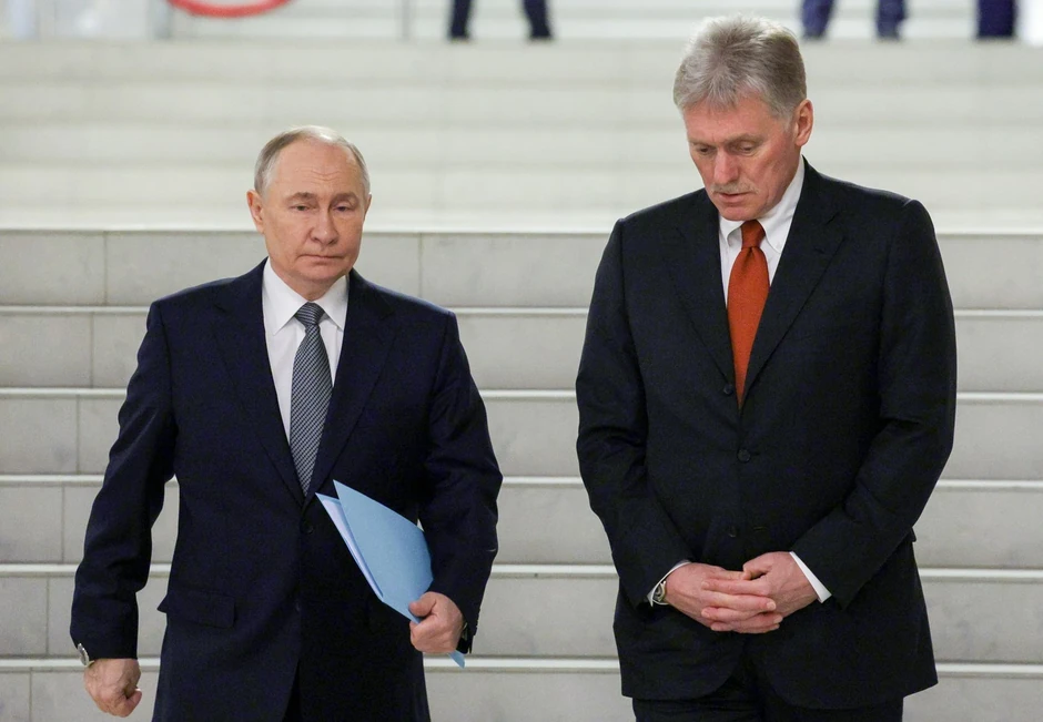 Vladimir Putin i Dmitrij Peskov