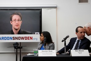 Edward Snowden speaks via video link during a news conference in New York 