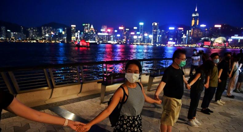 Hong Kong's skyscraper-studded harbourfront as well as several famous shopping districts were lined with peaceful protesters