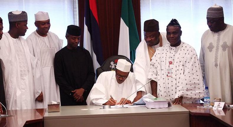 President Muhammadu Buhari signs 2016 budget on May 6, 2016