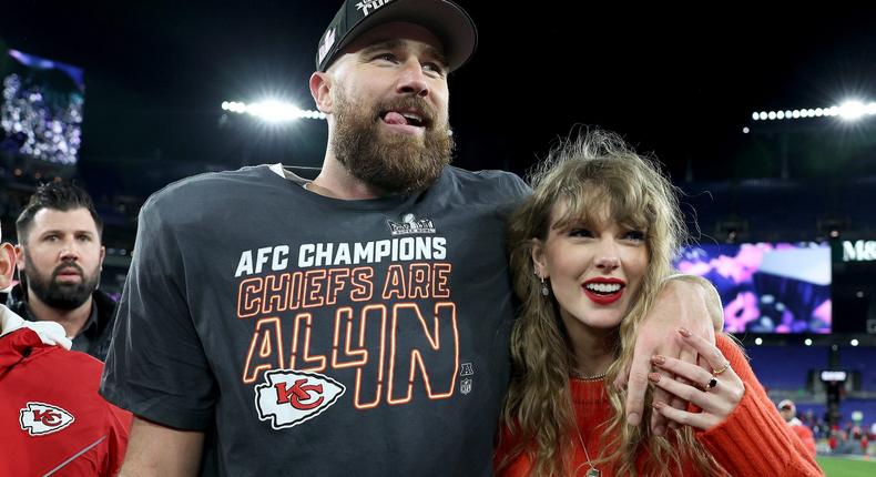 Travis Kelce and Taylor Swift celebrate the Chiefs' AFC Championship win.Patrick Smith/Getty Images