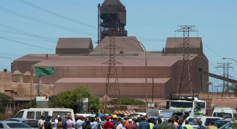 Workers protest outside the Arcellor Mittal Saldanha steel plant against the planned closure of the operation which would result in 900 jobs lost