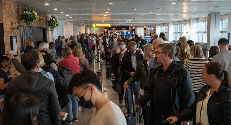 Frustrated passengers faced long delays amid the summer travel chaos.Carl Court / Staff / Getty Images