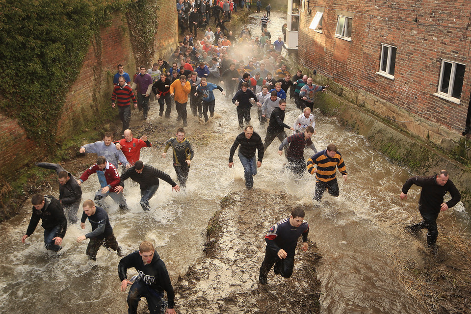 Enthusiasts Participate In The Royal Shrovetide Football Match