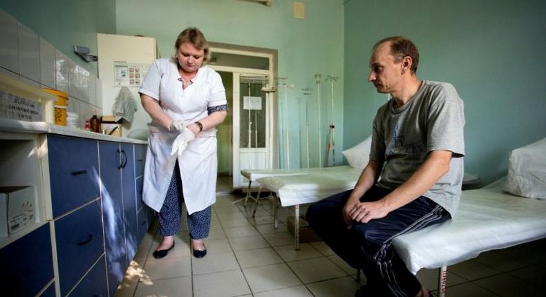 A patient waits in a hospital treating drug users in the rebel capital of Donetsk, Ukraine