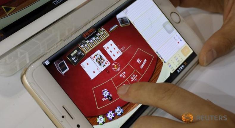 China arrests 98 in crackdown on online gambling rings