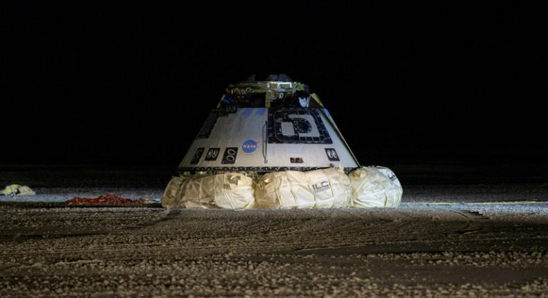 A Boeing Starliner capsule touches down in White Sands, New Mexico in December 2019 after an unsuccessful uncrewed test flight