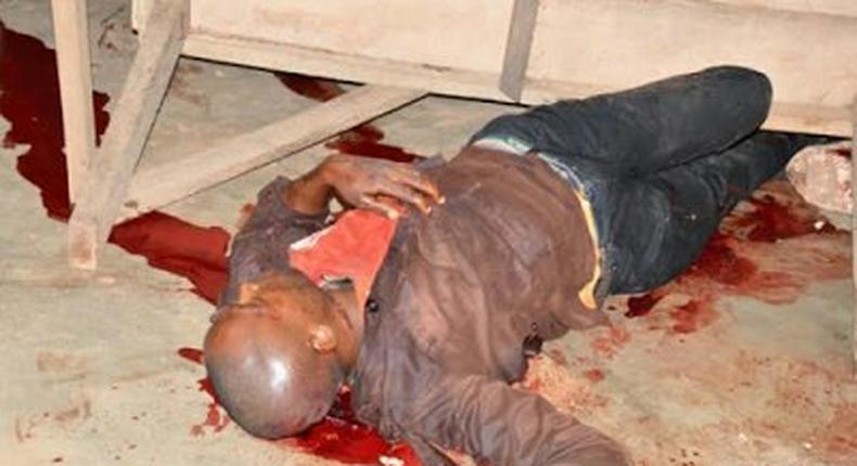 The body of one of the vigilante group members