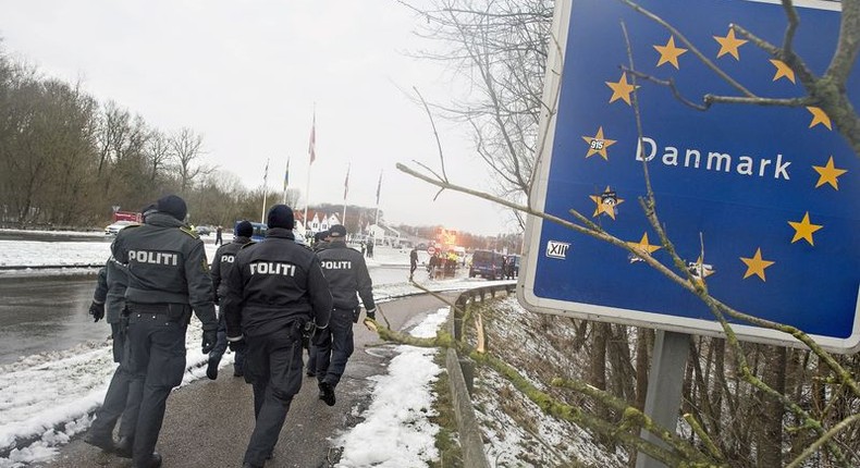 Police officers walk at the Danish-German border in Krusaa, Denmark January 9, 2016. REUTERS/Claus Fisker/Scanpix Denmark