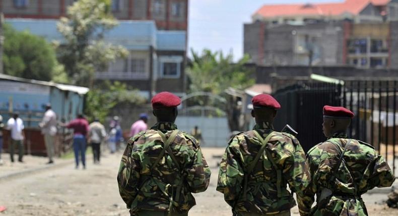 Kenya security forces patrol a neighbourhood of Nairobi