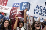 Supporters of the Affordable Care Act celebrate after the Supreme Court up held the law in the 6-3 v