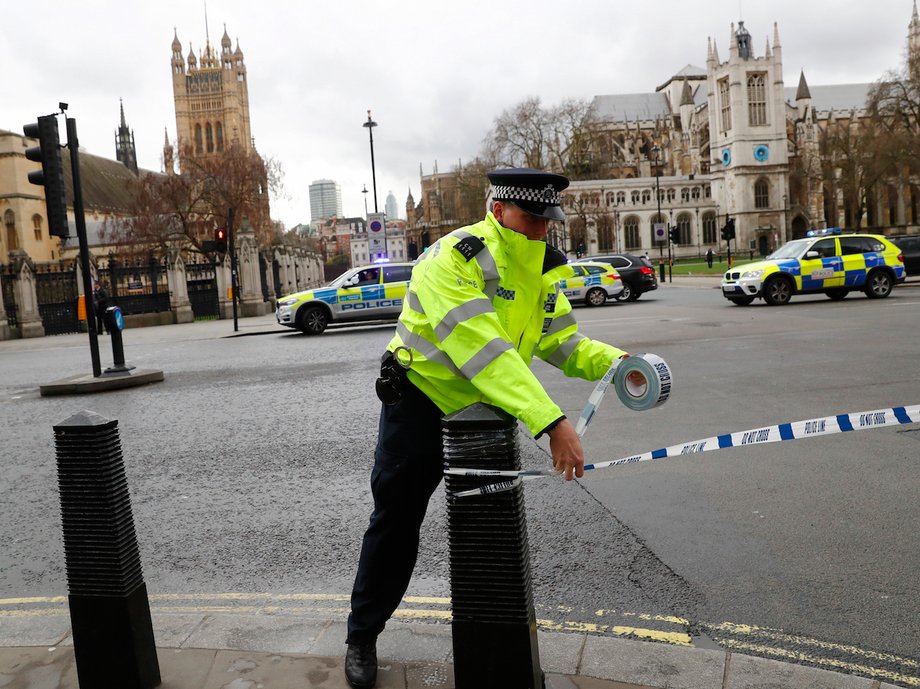 Police tapes off Parliament Square after reports of loud bangs, in London, Britain, March 22, 2017.