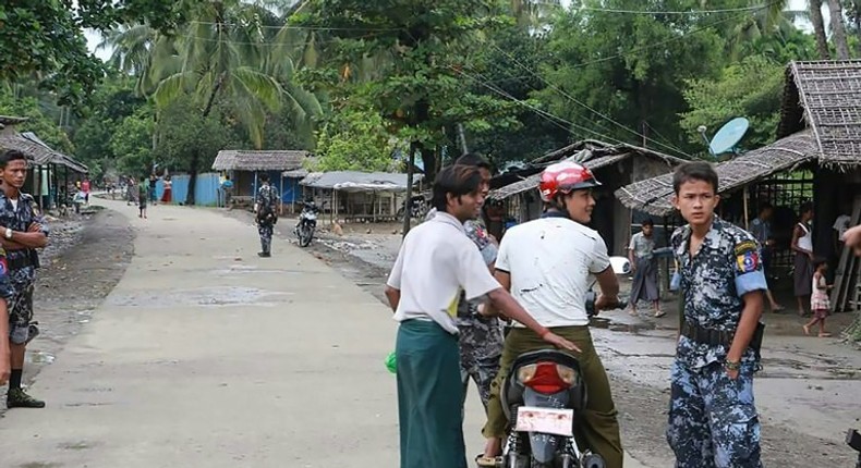 Myanmar border police conduct a road patrol in the village of Maungdaw, western Rakhine state, on October 10, 2016