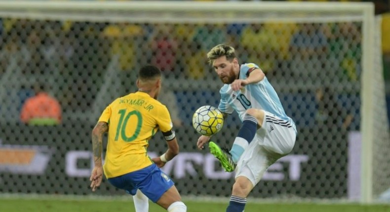 Brazil's Neymar and Argentina's Lionel Messi (right) vie for the ball during their 2018 FIFA World Cup qualifier match in Belo Horizonte, Brazil, on November 10, 2016