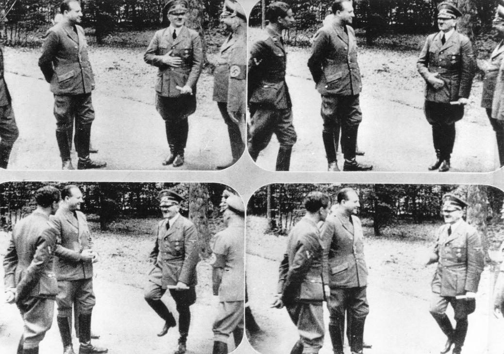 Adolf Hitler w swej belgijskiej kwaterze niedaleko Bruly-le-Peche w czerwcu 1940 r. Towarzyszą mu m.in. lekarz Karl Brandt; dyplomata Walther Hewel, osobisty przedstawiciel Joachima von Ribbentropa; oraz jego osobisty lekarz Theo Morell