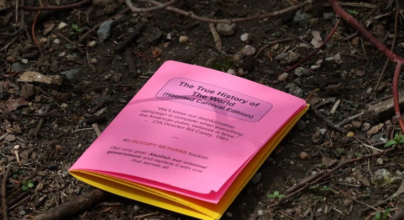 A view of a pamphlet thrown by Max Azzarello before he set himself on fire.Reuters