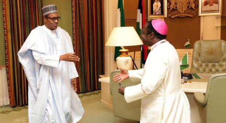 President Muhammadu Buhari meets with Bishop Matthew Kukah.