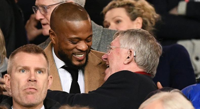 Patrice Evra with Alex Ferguson at the Man Utd v PSG first leg