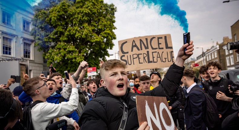 Soccer fans protest plans for a European Super League.
