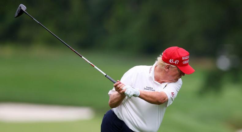 Former President Donald playing golf.Mike Stobe/Getty Images