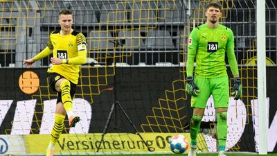 Borussia Dortmund's title hopes look dead and buried after a humiliating defeat at home to Bayer Leverkusen Creator: Ina Fassbender