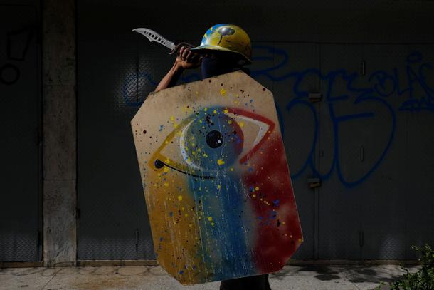 The Wider Image: Venezuela's shield-bearing protesters