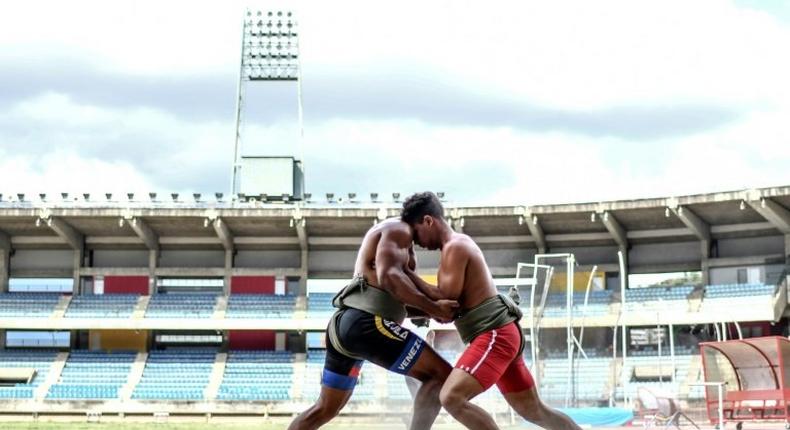 Venezuelan sumo wrestlers train at the Brigido Iriarte stadium in Caracas; despite a crushing economic crisis, sumo wrestlers are trying to grow the sport in the Latin American country