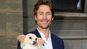 Glen Powell and Brisket the dog.Presley Ann/Getty Images